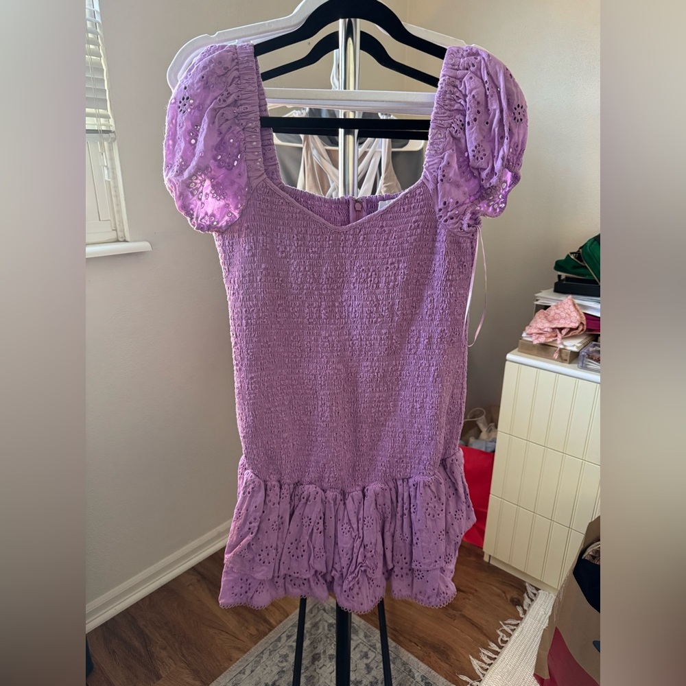 Likely purple dress